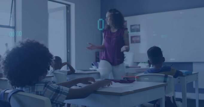 Teacher leading classroom, responding to raised hand while students using notebooks for feedback