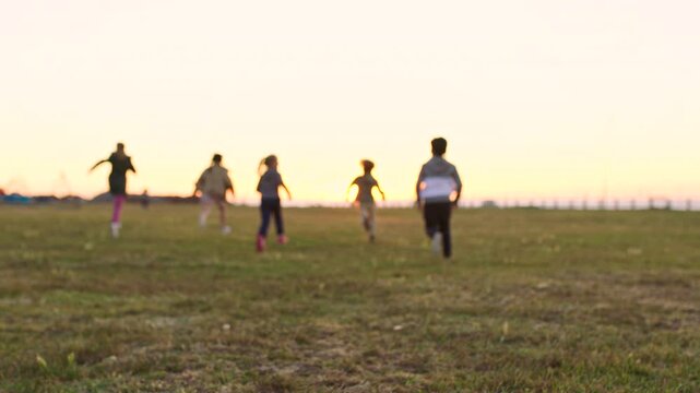 Fun, sunshine or kids in park with running, growth or peer race on weekend break. Space, back or children on field with playful competition, outdoor bonding or child development on summer game.