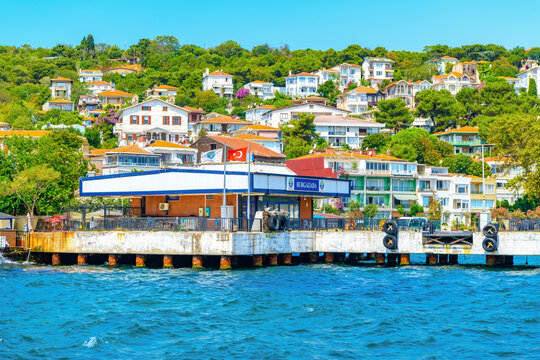 Istanbul, Turkey, August 8, 2025: Ferry terminal and coastal houses on Burgazada Island, Princes' Islands, Istanbul, Turkey.