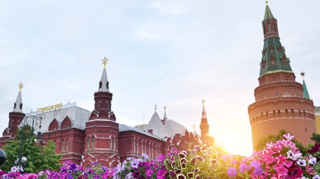 Red Square architecture and flowers with Kremlin tower, Moscow sunset