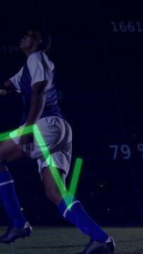 Vertical video: Sports player kicking on ball appearing, green chart sliding over him for data