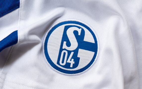 Kyiv, Ukraine. March 21, 2026. Close-up of FC Schalke 04 crest on a white and blue football jersey.