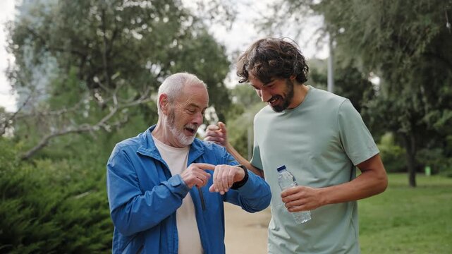 Senior active man doing sport tracking cardio fitness levels with smartwatch for healthy lifestyle