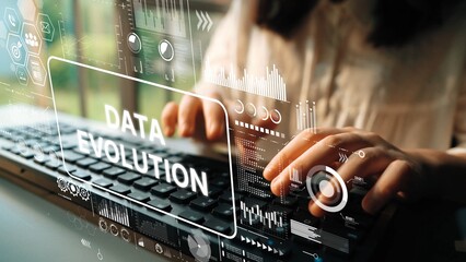 Fototapeta premium Modern hands typing on keyboard with digital data evolution graphics in background showcasing technology progression. Asymptotic smart data analytic.