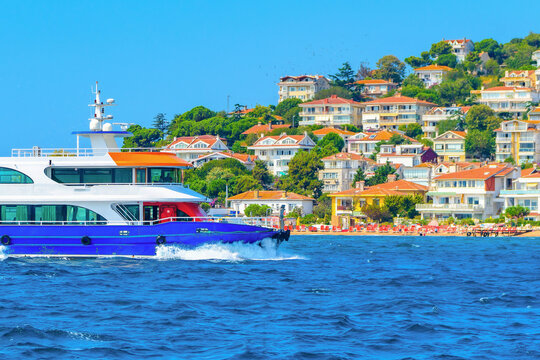 Passenger ferry sailing along the coast of Heybeliada island in the Sea of Marmara, Istanbul, Turkey.