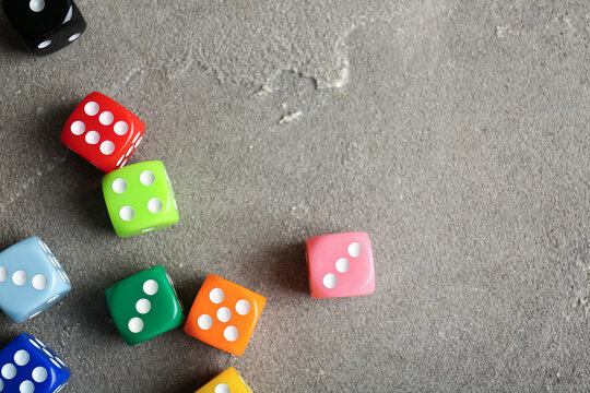 Different dices on grey background
