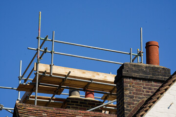 Naklejka premium Construction works and scaffold