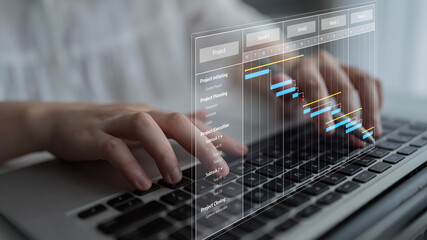 Fototapeta premium A visual representation of project management through a Gantt chart displayed on a laptop, illustrating timelines and milestones crucial for efficient project execution. Tessel