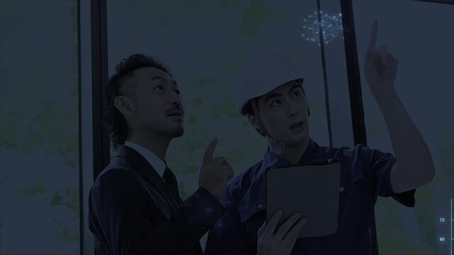 AIデータ分析を活用したビジネス対話マーケティングシーン　工業のdx化と作業着とスーツの男性の打ち合わせ動画　テクノロジーのモーショングラフィックス付き