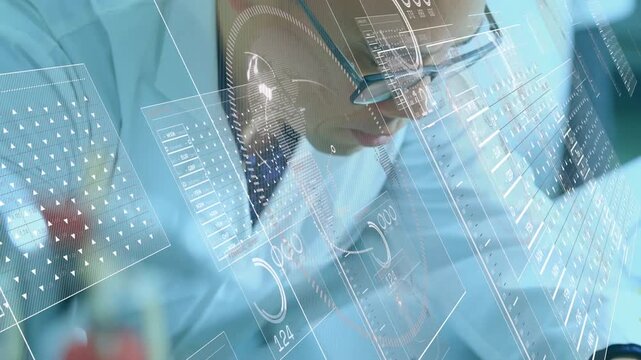 Connecting sensor cables, engineer monitoring floating data readouts calibrating medical device