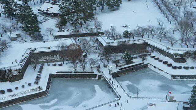 Bridge over frozen moat in Hakodate Japan. High angle