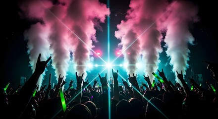 Obraz premium Concert crowd with colorful lights smoke.