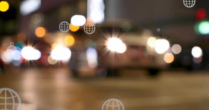 Animation of globe icons over blurred vehicles stopped on signal and people crossing street