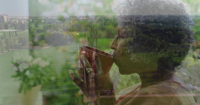 Holding hot drink, elderly person viewing cityscape and greenery with animation