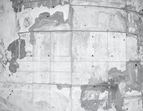 Aged concrete wall texture with stains and panel pattern, grunge industrial background