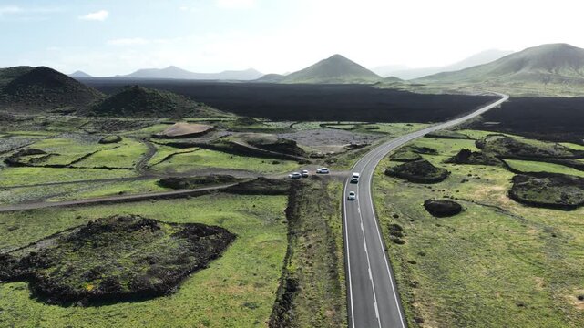 Lanzarote road through unique volcanic landscape and vineyards