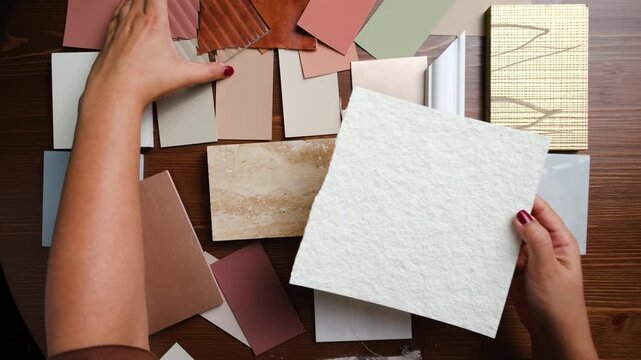 Home renovation planning with material samples, color swatches and design board
