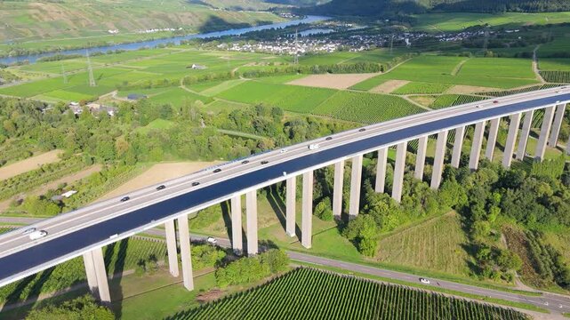 Moselle Viaduct Longuich, vineyard in Mosel valley, bridge of highway crossing river near Trier, german autobahn, aerial view