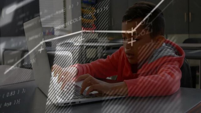Boy placing hands on keyboard and typing, charts and code overlaying laptop for school analysis