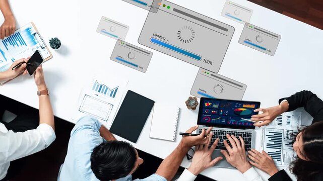 Business Meeting with Focus on Data Analysis and Technology, Professionals Using Laptop and Smartphone for Digital Strategy and Progress Monitoring Gluon.