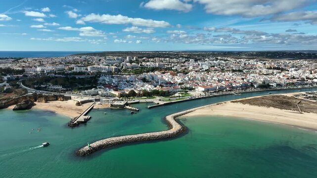 Coastal city and rugged shoreline along the southern coast in Europe