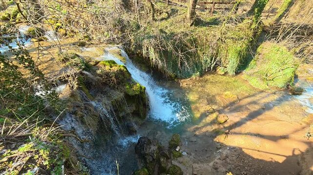 Approaching Wooden Fence Above Forest Waterfall . Ozren Mountain, Sokobanja region. Balkans, Serbia.