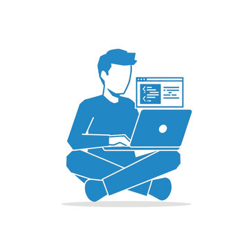 Man sitting on floor working on laptop with code and browser windows on screen