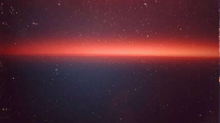 Fototapeta premium Vintage Film Abstract with Red Light Leak on Dark Starry Background