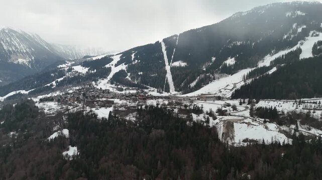 Aerial view of le Praz village in Courchevel ski resort by winter