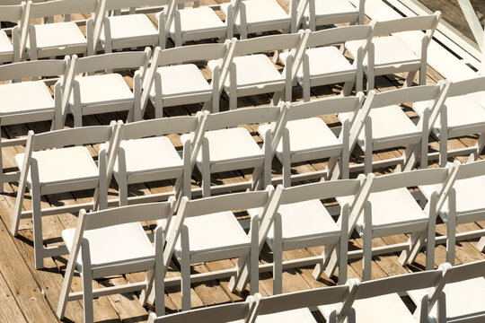 Canada, BC, Vancouver.  Rows of folding chairs.  Awaiting guests at outdoor wedding.