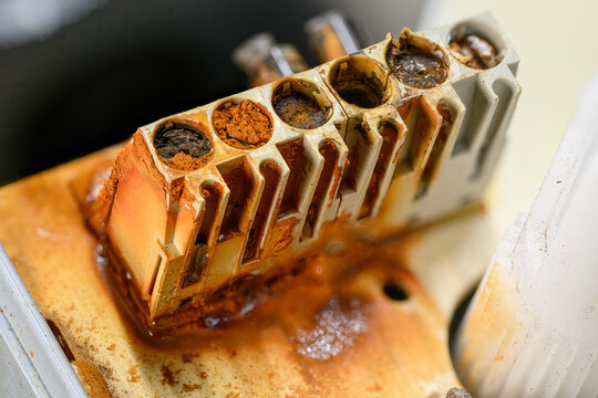 Detail of rusty screws on a terminal block.