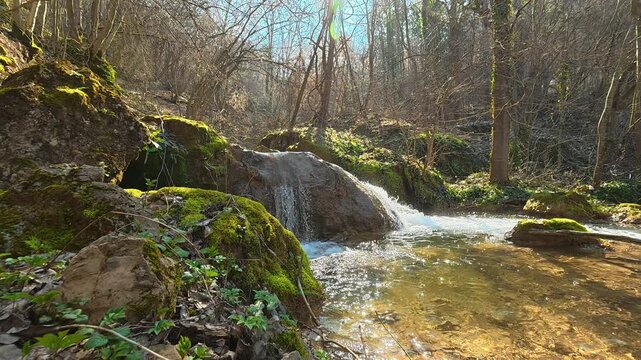 Low Angle View of Stream Flowing into Natural Pool Waterfall. Ozren Mountain, Sokobanja region. Balkans, Serbia.