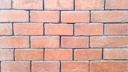 Obraz premium Rough textured red brick wall background pattern