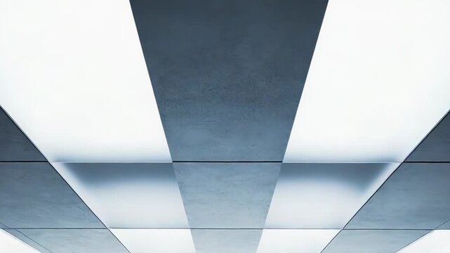 Bright minimalist interior architecture creates a spacious and empty industrial design, featuring a large illuminated opening at the end of the well lit room