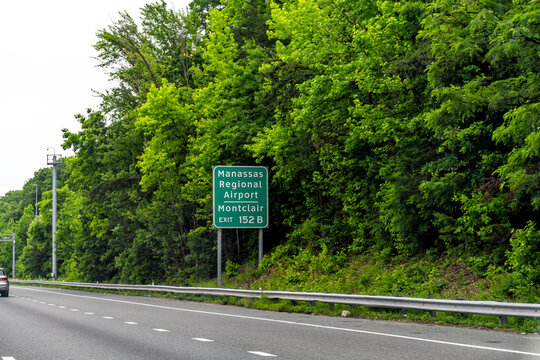 Manassas regional airport sign by Montclair in Prince William county of Northern Virginia for local airplane on highway road i-95
