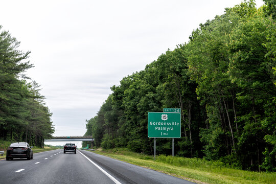 Gordonsville Palmyra Virginia road sign for rural countryside towns by interstate highway i-64 in summer scenic landscape view