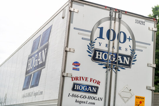 Garrisonville, USA - May 27, 2025: Hogan truck sign employment work job advertisement, phone number for trucking business company