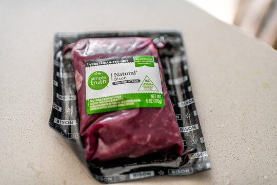 Roseland, USA - March 14, 2025: Fresh raw packaged ground bison steak by Kroger simple truth private label brand company grass-fed sirloin meat