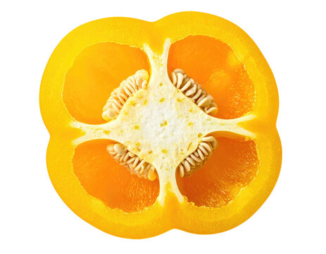 Bright yellow bell pepper cross-section reveals seeds, flesh, and white pith