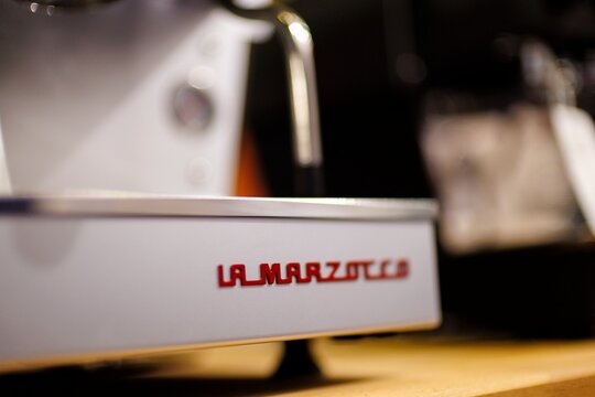 lose-up of La Marzocco espresso machine in a coffee shop environment