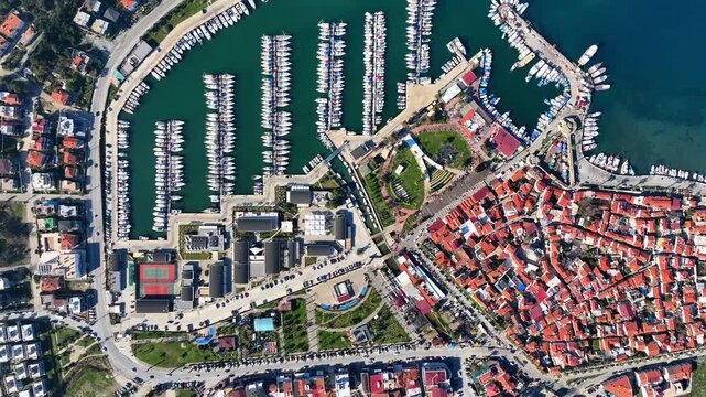 Peaceful Aerial View of Teos Marina and Sığacık, Izmir Turkey - Aerial view of Teos Marina and Sığacık in Izmir, Turkey, featuring a peaceful harbor, boats and clear blue Aegean Sea.