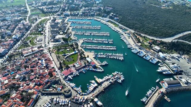Peaceful Aerial View of Teos Marina and Sığacık, Izmir Turkey - Aerial view of Teos Marina and Sığacık in Izmir, Turkey, featuring a peaceful harbor, boats and clear blue Aegean Sea.