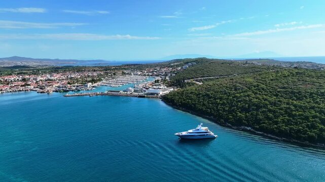Peaceful Aerial View of Teos Marina and Sığacık, Izmir Turkey - Aerial view of Teos Marina and Sığacık in Izmir, Turkey, featuring a peaceful harbor, boats and clear blue Aegean Sea.