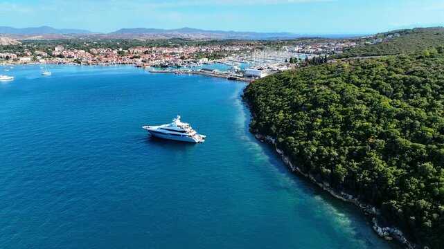 Peaceful Aerial View of Teos Marina and Sığacık, Izmir Turkey - Aerial view of Teos Marina and Sığacık in Izmir, Turkey, featuring a peaceful harbor, boats and clear blue Aegean Sea.