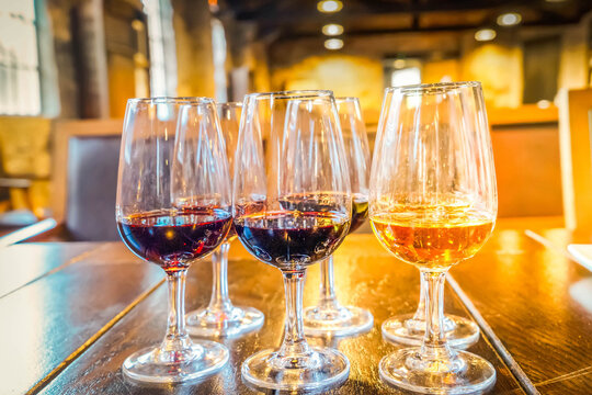 port wine testing, glasses with drink samples in bar