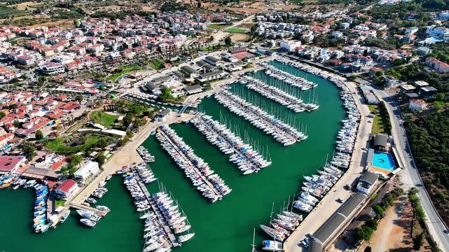 Peaceful Aerial View of Teos Marina and Sığacık, Izmir Turkey - Aerial view of Teos Marina and Sığacık in Izmir, Turkey, featuring a peaceful harbor, boats and clear blue Aegean Sea.