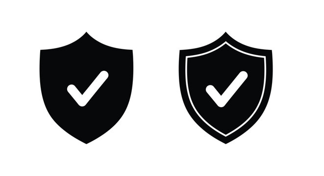 Two black boots displayed side by side in a stark silhouette