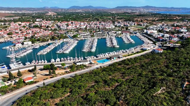 Peaceful Aerial View of Teos Marina and Sığacık, Izmir Turkey - Aerial view of Teos Marina and Sığacık in Izmir, Turkey, featuring a peaceful harbor, boats and clear blue Aegean Sea.