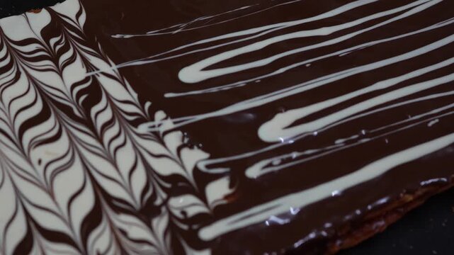 chocolate glaze with white chocolate decoration