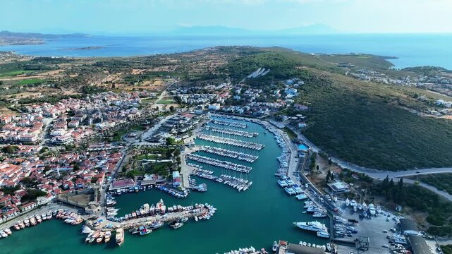 Peaceful Aerial View of Teos Marina and Sığacık, Izmir Turkey - Aerial view of Teos Marina and Sığacık in Izmir, Turkey, featuring a peaceful harbor, boats and clear blue Aegean Sea.